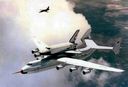 Buran_OK-1K1_atop_the_mighty_Antonov_An-225_Mriya_28Dream29_purpose-built_Buran_transport_with_a_Aero_L-39_chase_plane_circa_1988-1989.jpg